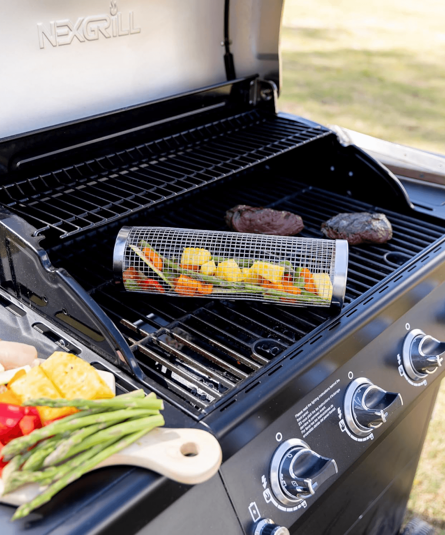 Grill basket cooking on BBQ