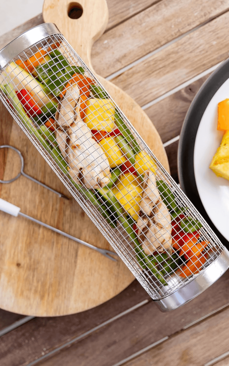 Person grilling with a BRYN product outdoors