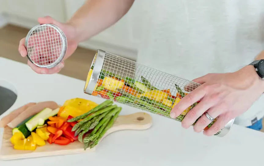Filling the grill basket with fresh ingredients